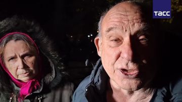 После удара по жилому дому в Донецке среди обломков и огня остались люди