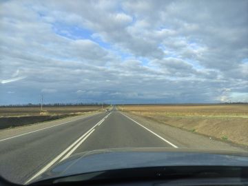 Председатель Правительства РФ Михаил Мишустин открыл в режиме ВКС обновленный участок трассы Донецк - Новоазовск - Седово на площадке выставки «Траспорт России»