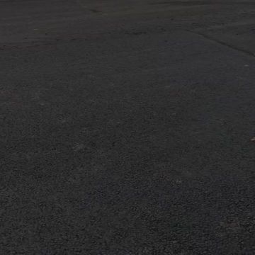 При поддержке Амурской области в Амвросиевкие на улице Ленина в центре укладывается асфальт