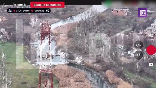 Кадры с российским флагом, развевающимся над телевышкой освобожденного Северска, поступили в распоряжение "Известий"