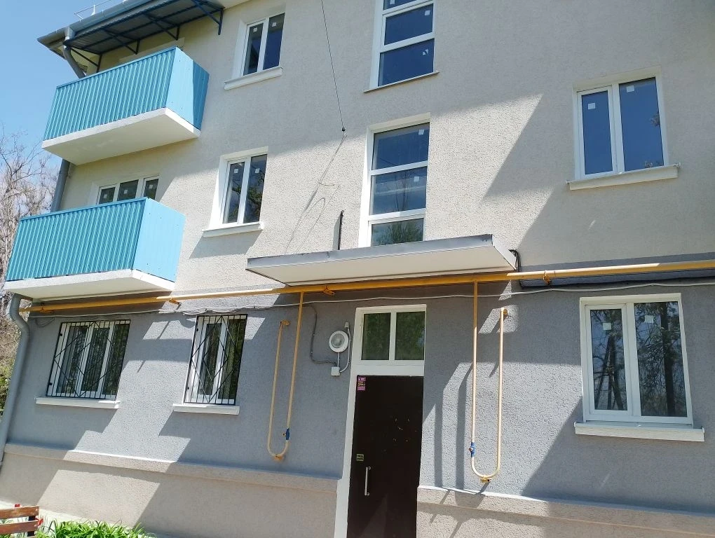 Восстановлен многоквартирный дом на улице Токарева в г. Мариуполе