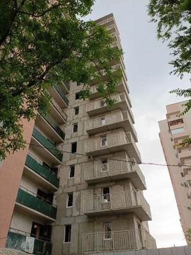 Высотку в Мариуполе постепенно возвращают к жизни