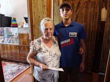 Активисты Ждановки поздравили с днём рождения бывшую узницу концлагерей